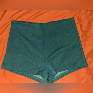 Green shorts with side zipper